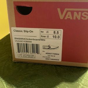 VANS BLACK AND WHITE CHECKERBOARD SLIP-ON